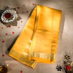 Lavish Yellow Silk Saree with Unique Shimmering Golden Geometric Border