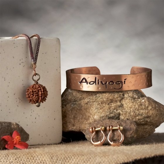 Adiyogi Rudraksha Set. A combo of one Adiyogi rudraksha with copper chain, a pair of Adiyogi copper earrings and an Adiyogi copper cuff. For receiving the grace of the Adiyogi.