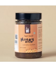 Honey Amla (500gm). Pure and unprocessed. No added sugar or jaggery. Preservative - free.