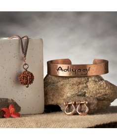 Adiyogi Rudraksha Set. A combo of one Adiyogi rudraksha with copper chain, a pair of Adiyogi copper earrings and an Adiyogi copper cuff. For receiving the grace of the Adiyogi.