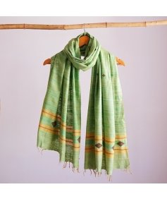 Naturally dyed handwoven pista-coloured eri silk stole showcasing a harmonious blend of traditional and contemporary design