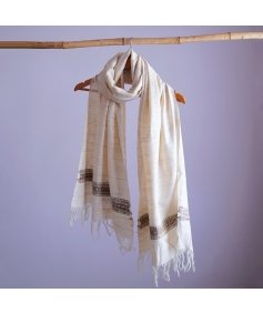 Chic off-white eri silk stole, naturally dyed with tea leaves, showcasing an intricately designed traditional pattern band
