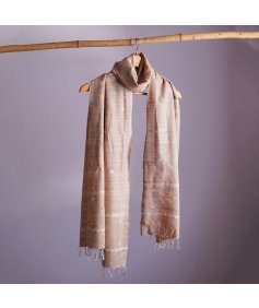 Sophisticated light brown eri silk stole, naturally dyed with tea leaves, featuring traditional white patterns