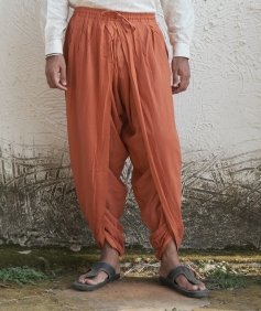 Isha’s signature. Ready to wear Unisex Dhoti Pants (Rust) / Panchakacham. Certified organic cotton. Easy to pull on. Versatile. Comfortable for both casual and formal wear.
